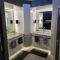Modern bathroom with two vanities
