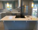 Large kitchen island with electric cooktop
