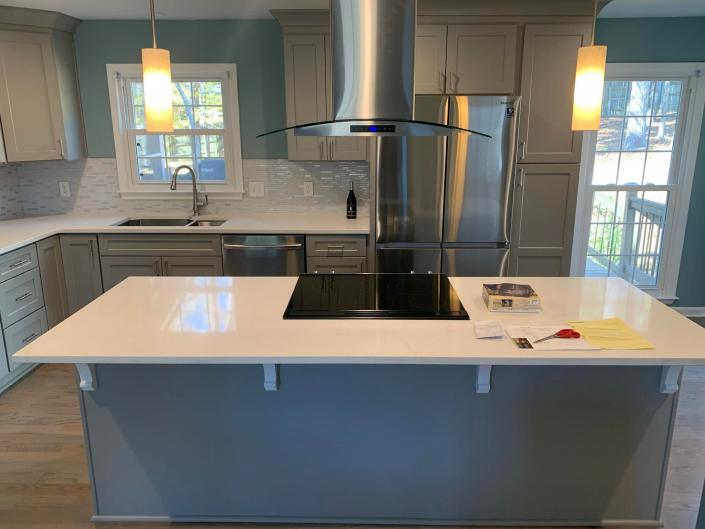 Large kitchen island with electric cooktop