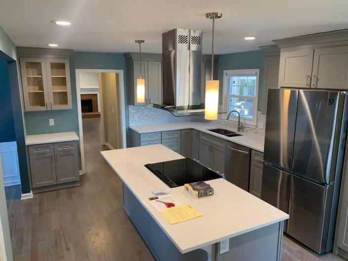 Kitchen remodel with gray cabinets and island