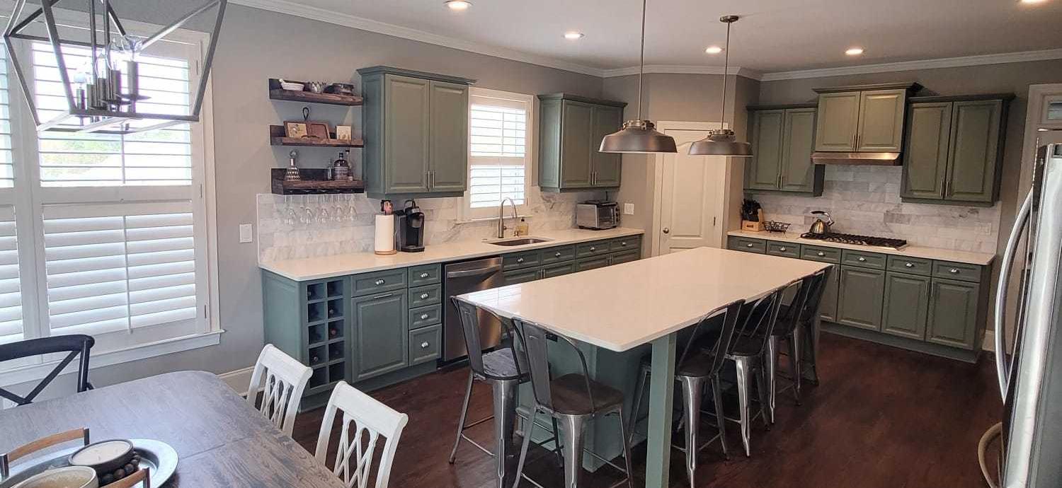 Kitchen remodel with sage green cabinets