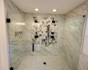 Large luxury shower with glass encasing