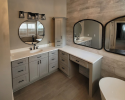 Remodeled bathroom with large vanity and soaking tub