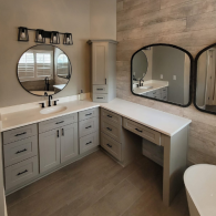 Remodeled bathroom with large vanity and soaking tub