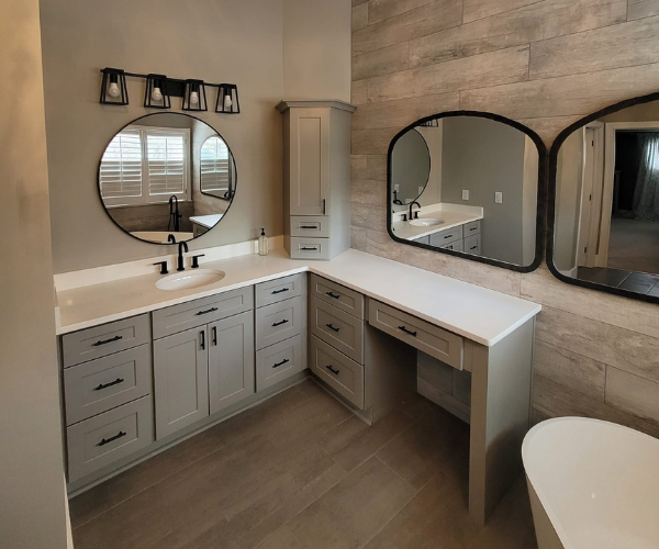 Remodeled bathroom with large vanity and soaking tub