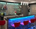 Modern bar and kitchenette in finished basement
