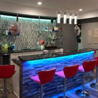 Modern bar and kitchenette in finished basement