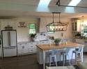 Kitchen renovation featuring butcher block island and shiplap backsplash
