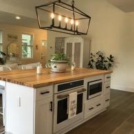 Butcher block island with oven and microwave