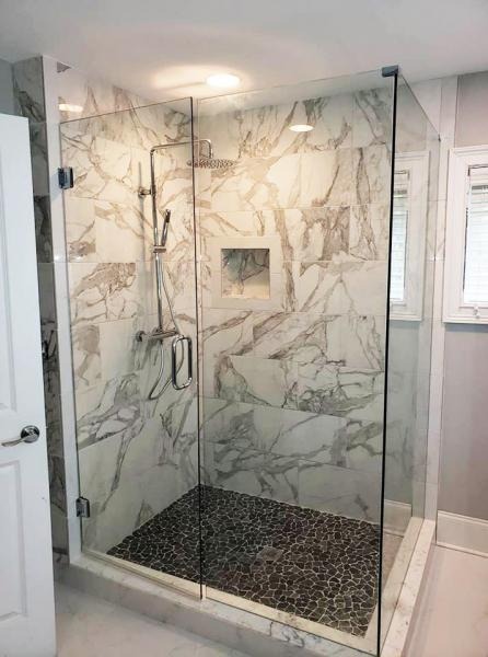 Luxury rain shower with glass enclosure