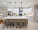 Modern, all white kitchen with large island