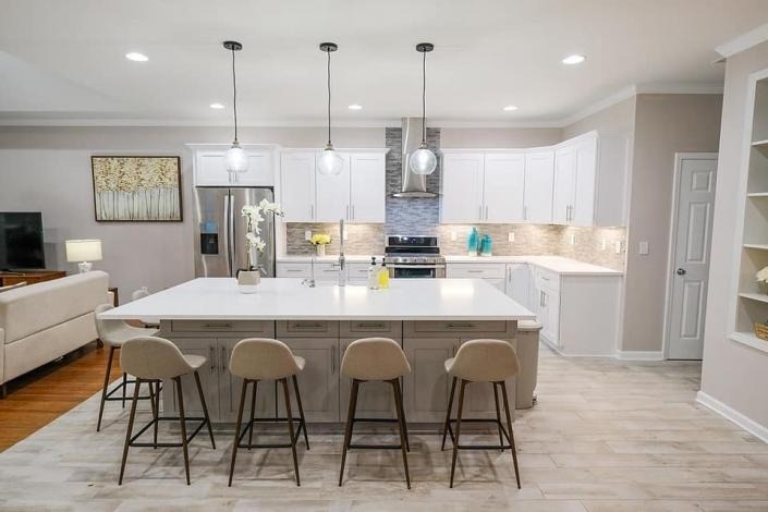 Modern, all white kitchen with large island